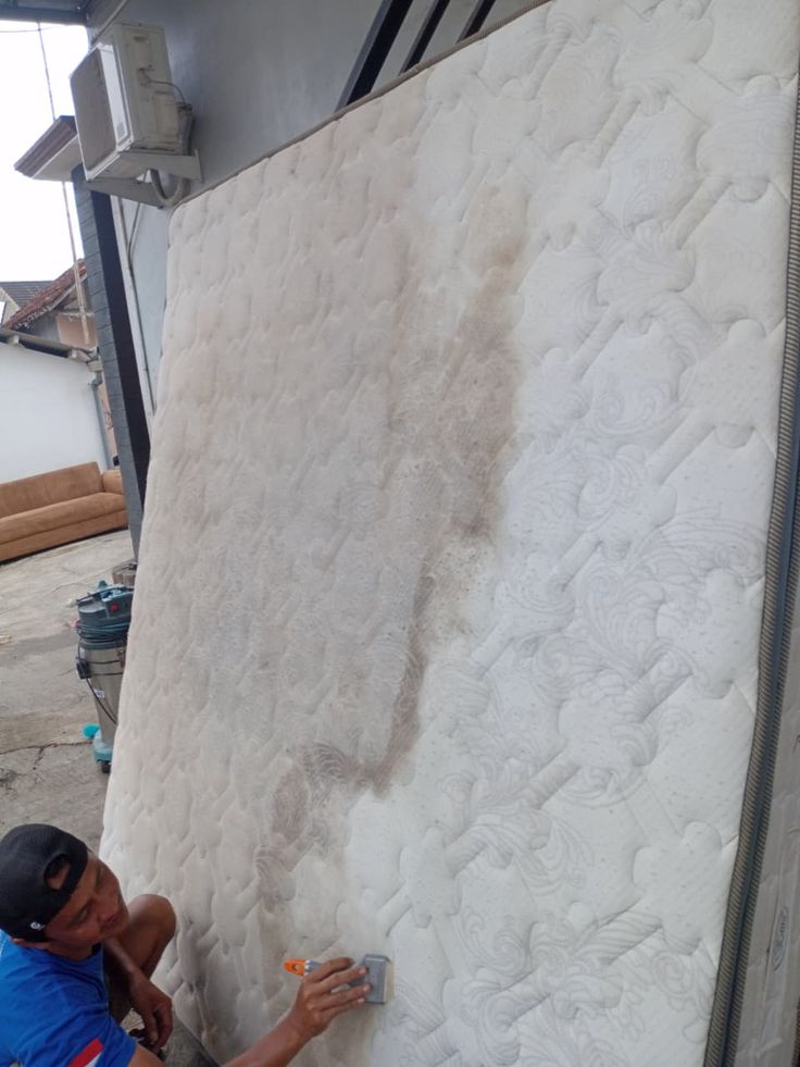 Vệ sinh Anh Quân chuyên giặt đệm lò xo Hà Đông